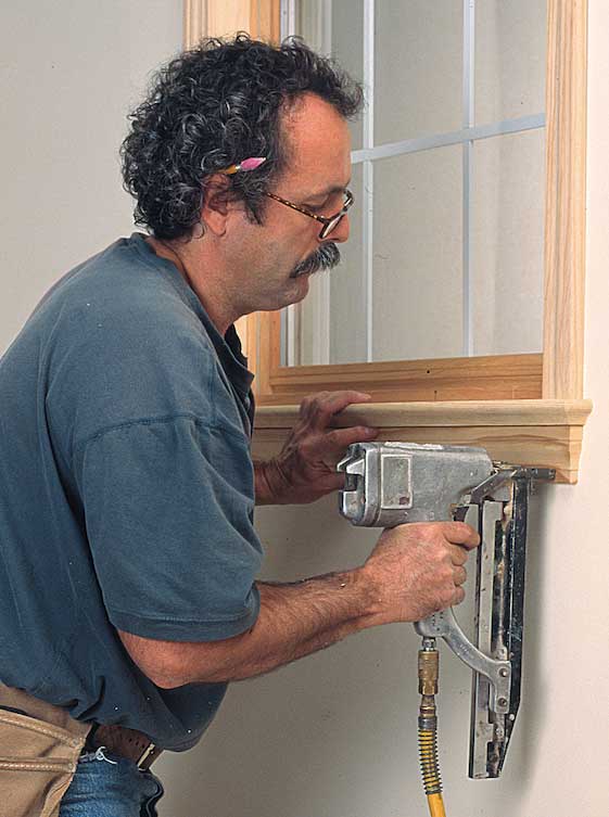 The final act of carpentry when trimming a window is setting the apron. Its ends should line up with the edge of casing legs, and it should fit snugly to the stool.