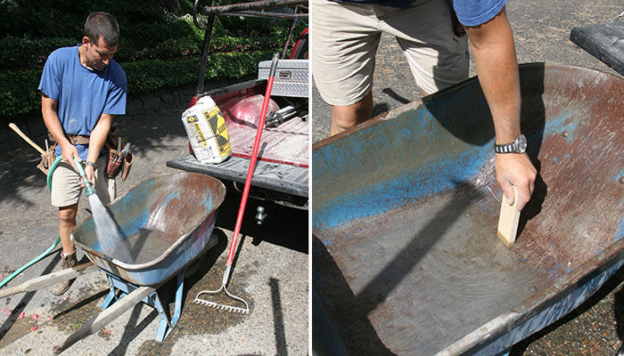 putting water in wheelbarrow