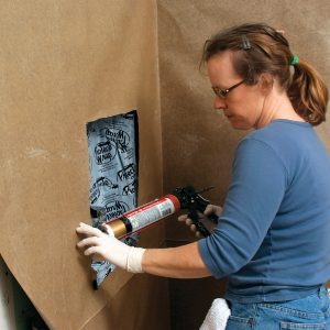 caulk membranes in shower niche