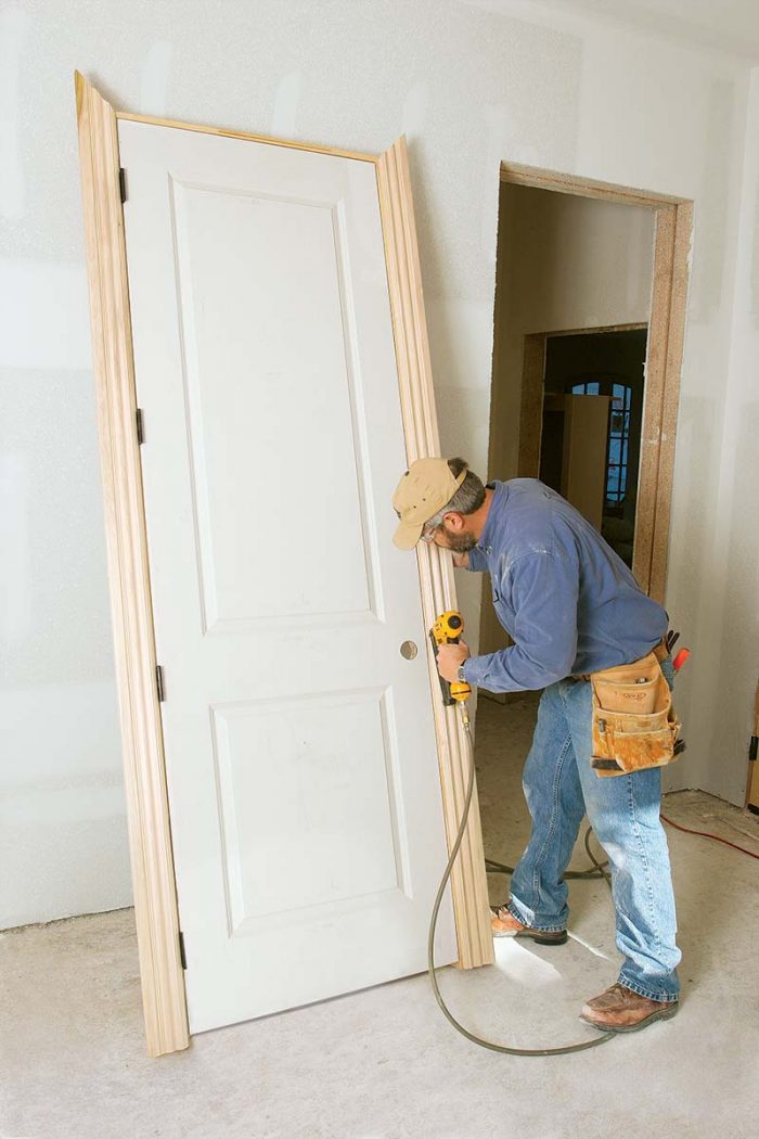 ter removing any nails that were holding the door in place for shipping, nail the casing to both jamb legs using 18-ga. brads.