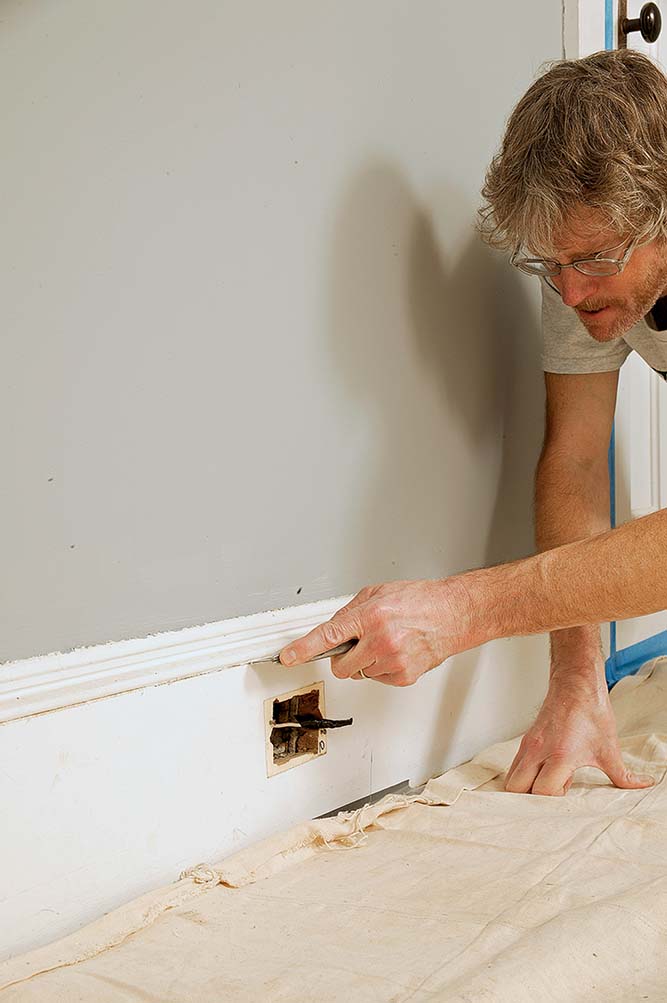 Run a sharp utility knife along the edge of each piece of trim