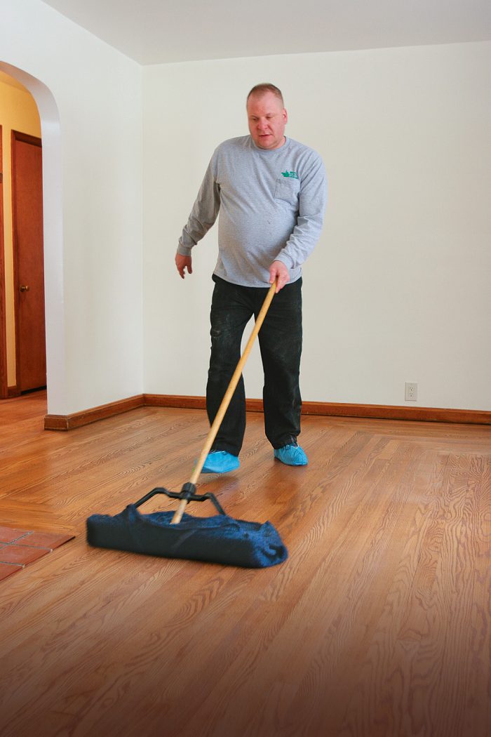 using a push-brook with tack cloth.