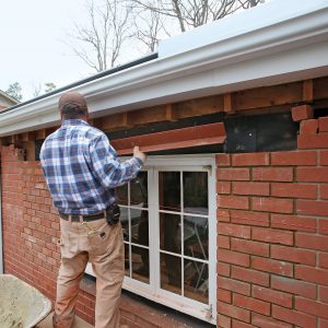 a man holding the lintel