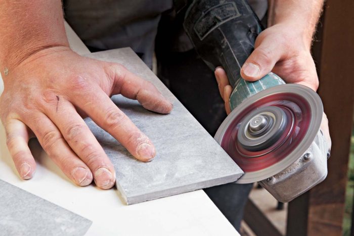 Grind miters by hand.