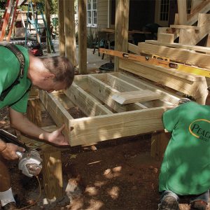 Complete the box. After the lower stair landing’s perimeter is complete, it’s a good time to install the interior blocking that supports the railing posts at each corner. 