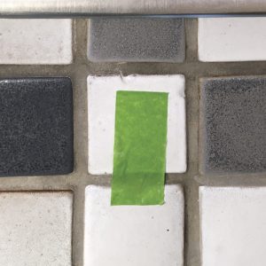 Green tape moved; polyurethane grout