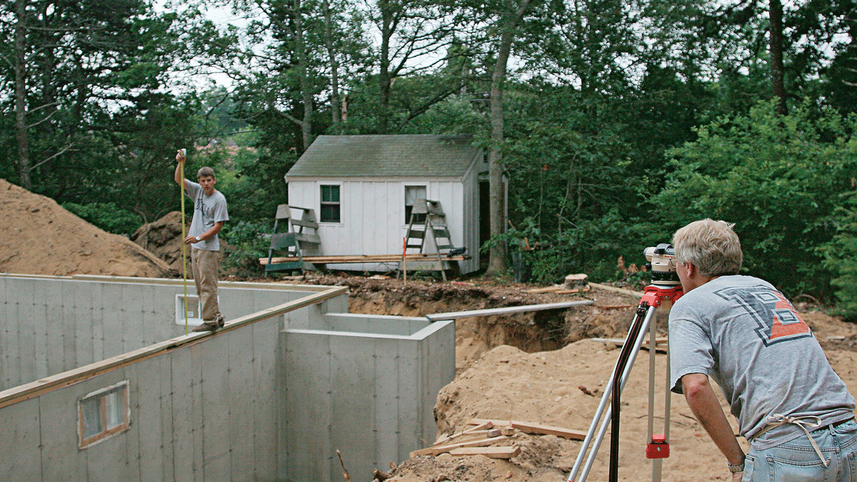 A transit can be used to determine how level the foundation is. Sight through the telescope as a helper moves a tape or measuring rod along the foundation or mudsill.