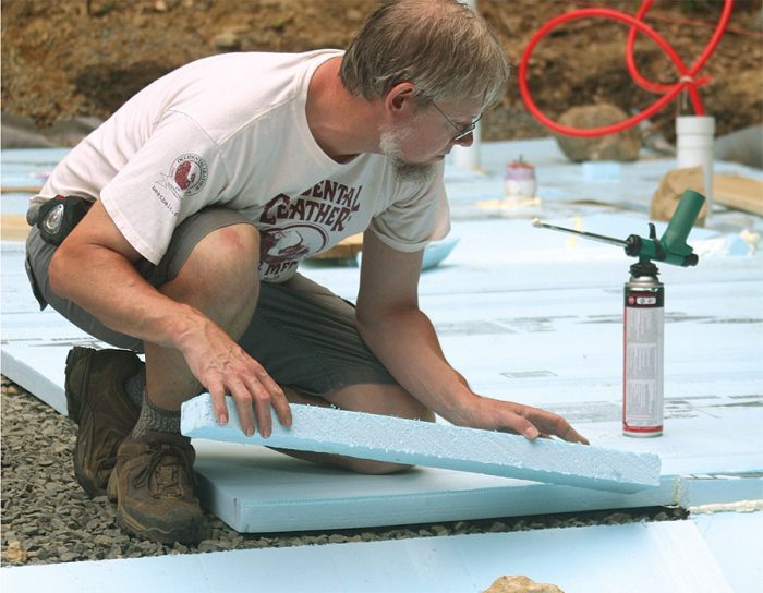 laying down extruded polystyrene