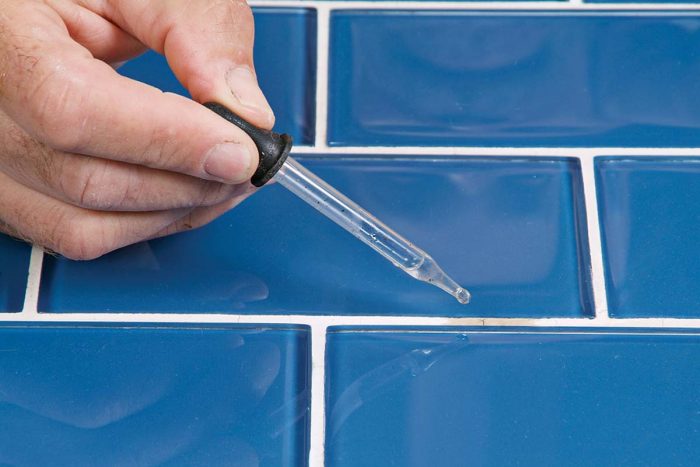 Drops of water will bead up on the grout if it’s still sealed.