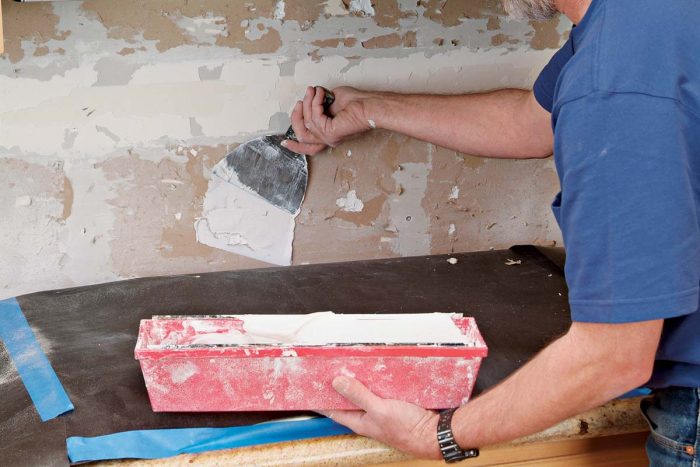 Patch holes throughout the wall with a quick-drying compound.