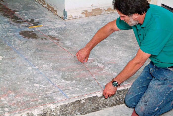 Using your original chalk color, snap a line parallel to the blue reference line to mark the center of the hallway.