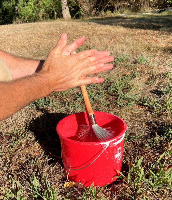 Spinning brush between hands