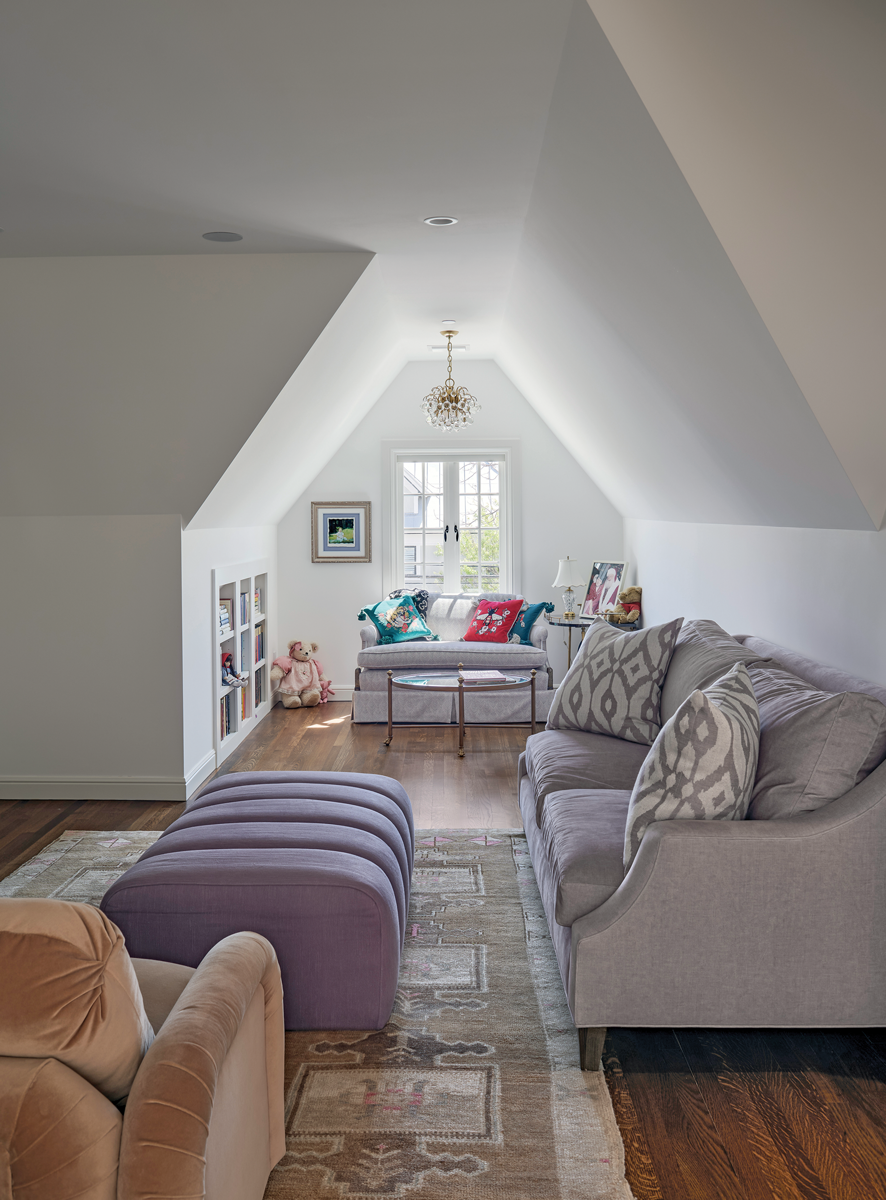 room with couch , chairs, and ottoman