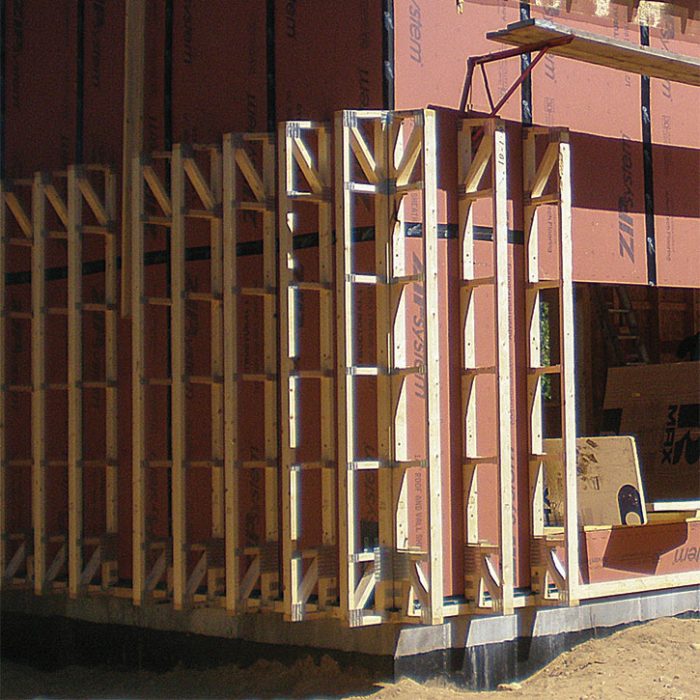 Open-web floor trusses as wall framing