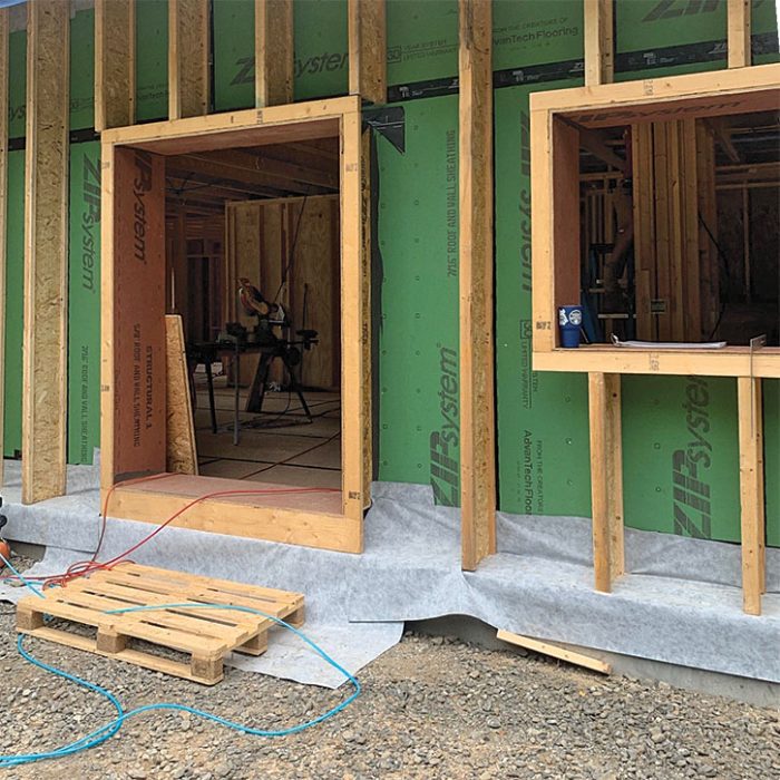 I-joists over wall sheathing around a window and door