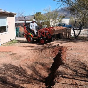 Mike’s: Loader/backhoe rental