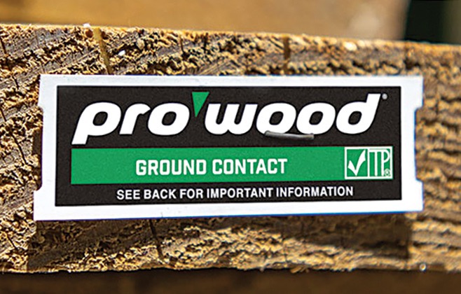 Close-up photo of the label on a piece of Pro Wood ground contact presure-treated lumber.