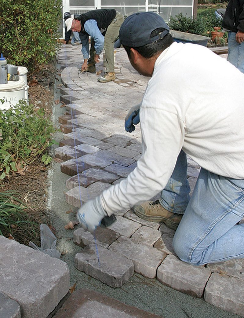 snapping a chalkline for a straight cut at end of patio