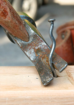 pulling nails out of wood